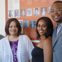 The Hall Family Poses with Mural.jpg